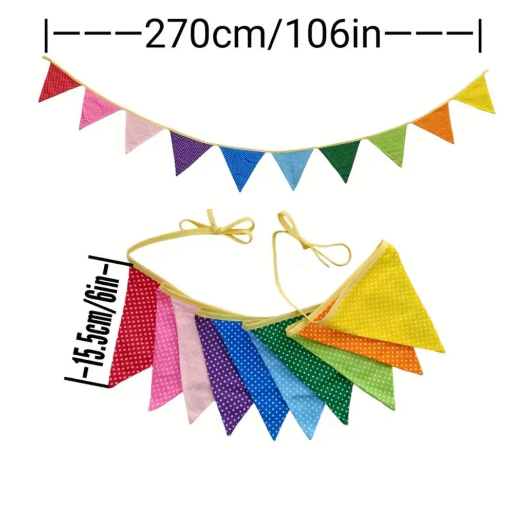 Bright multicoloured bunting with pom poms