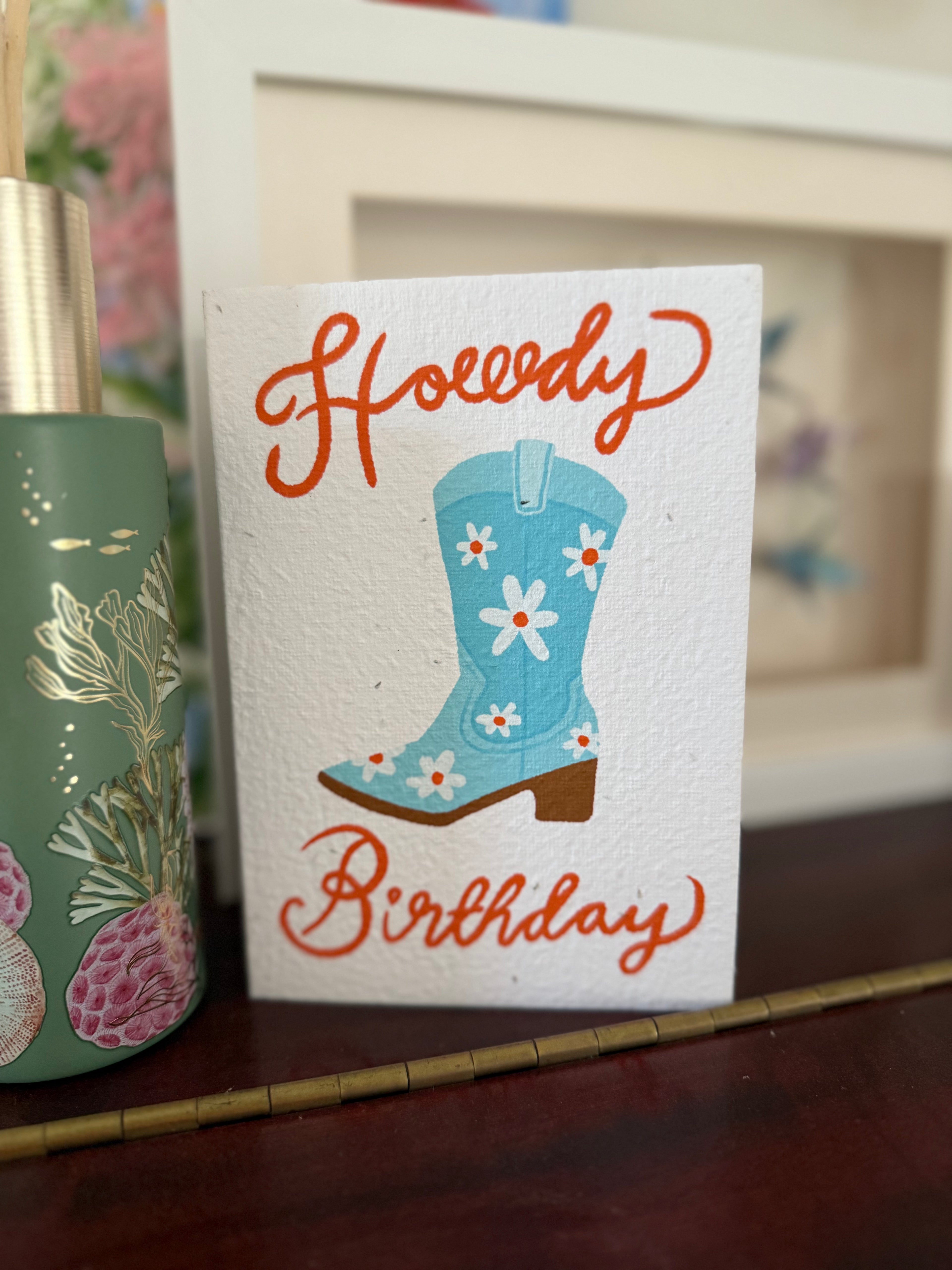 Howdy Birthday Plantable Greeting Card, embedded with Swan River Daisy seeds, with a cowboy boot on it, Available Australia wide. 