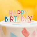 Colourful happy birthday cake topper by Ginger Ray, unisex birthday, bright and colourful kids party ideas